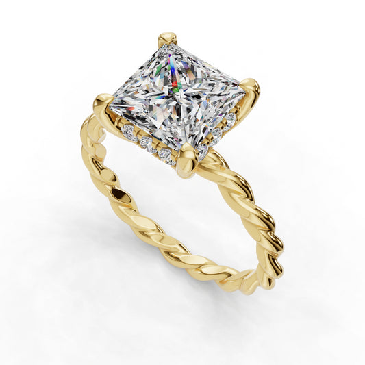 Gold ring with large square diamond centerpiece.