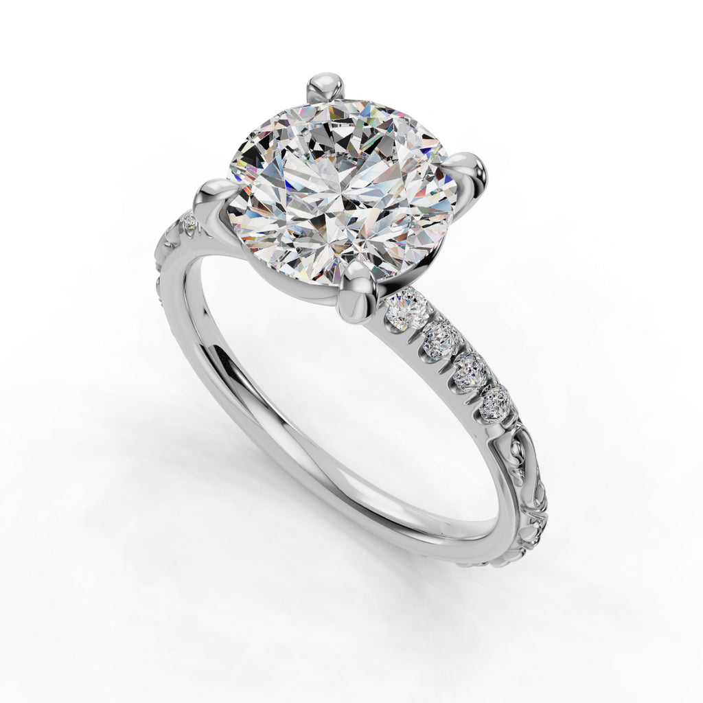 Round diamond ring with pavé band accents.
