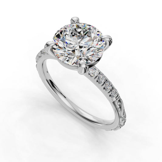 Round diamond ring with pavé band accents.