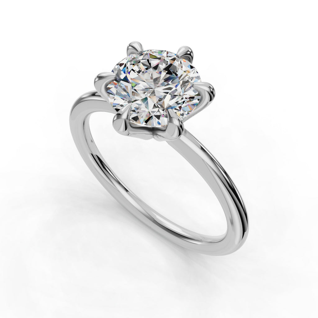 Solitaire diamond ring with six-prong setting.