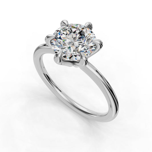 Solitaire diamond ring with six-prong setting.