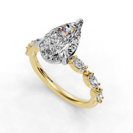 Pear-shaped diamond ring with gold band.