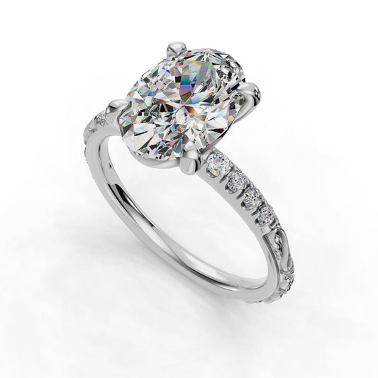 Oval diamond ring with side stone accents.