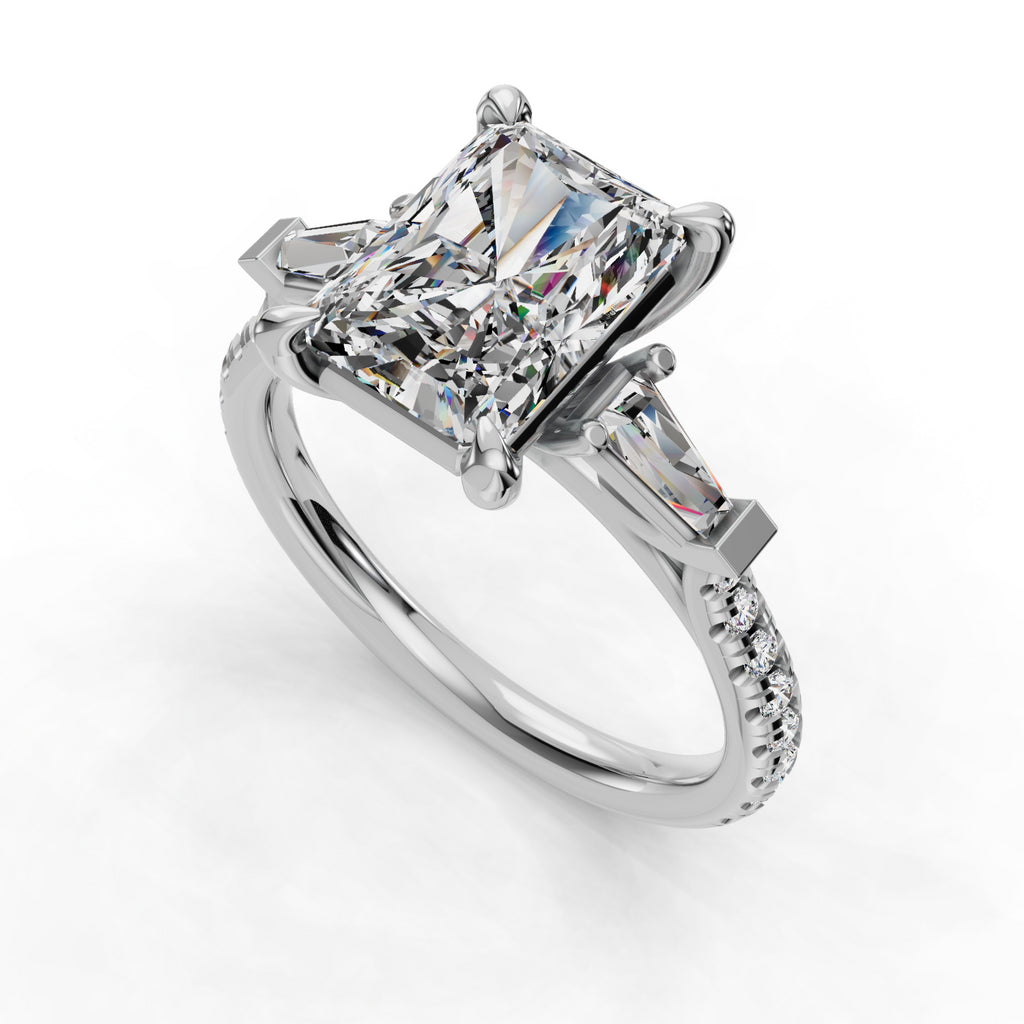 Radiant-cut diamond ring with tapered baguettes.