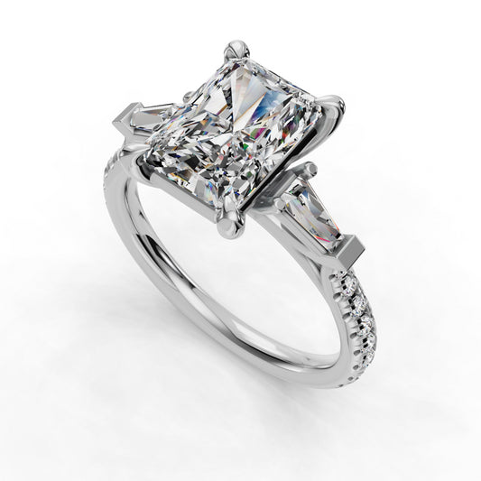 Radiant-cut diamond ring with tapered baguettes.