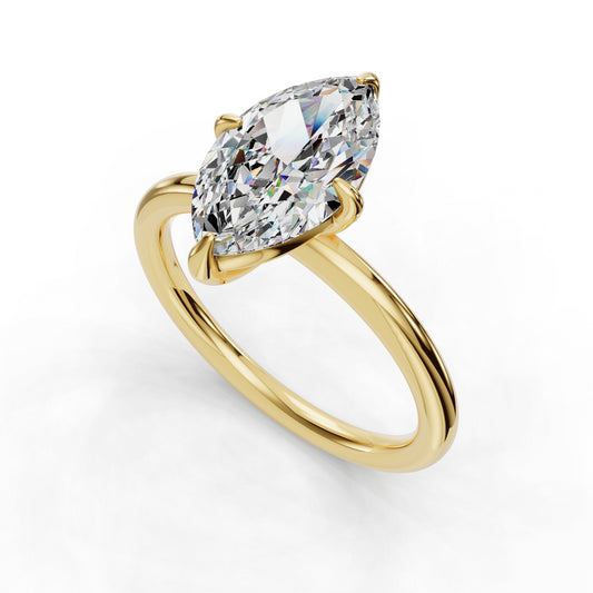 Marquise diamond solitaire on gold band.