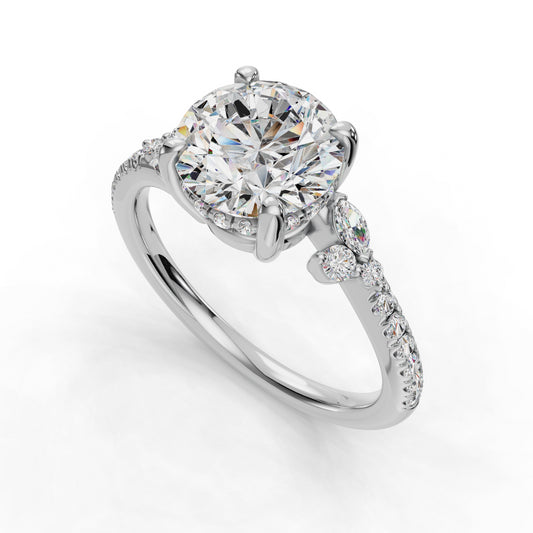 Round diamond ring with pavé band accents.