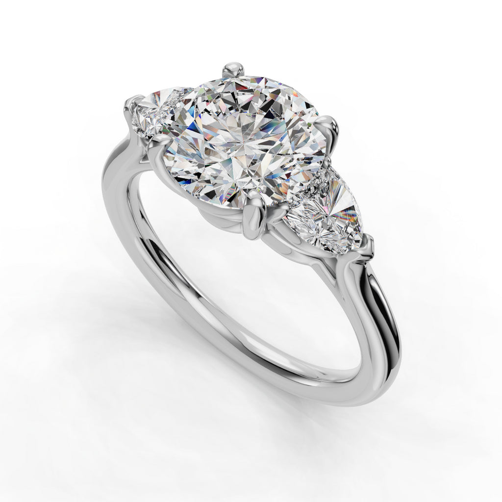 Three-stone diamond ring with round center.