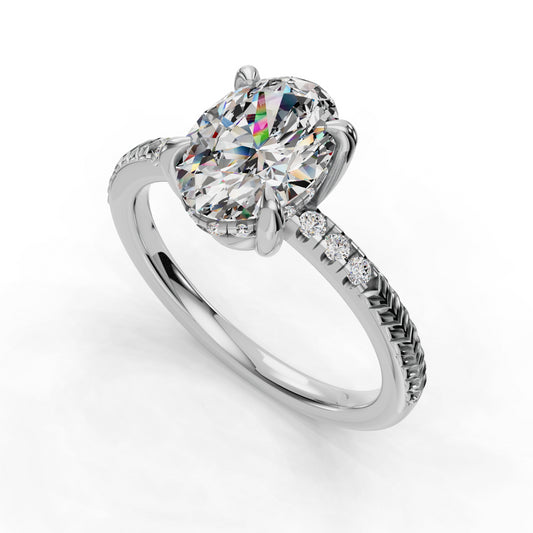 Oval diamond ring with side stones.