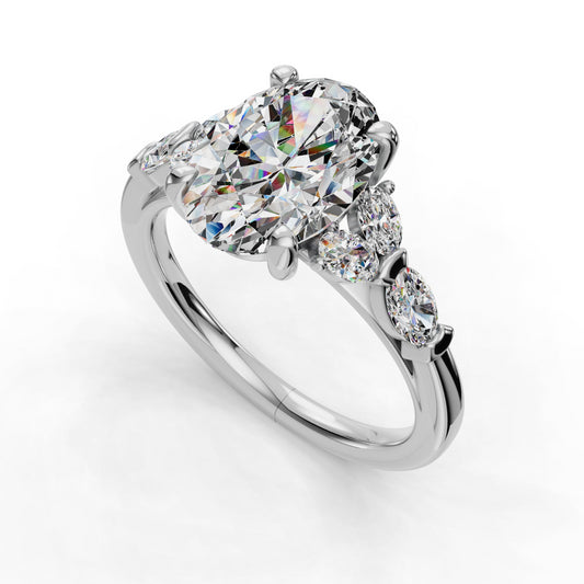 Oval diamond ring with side stones.