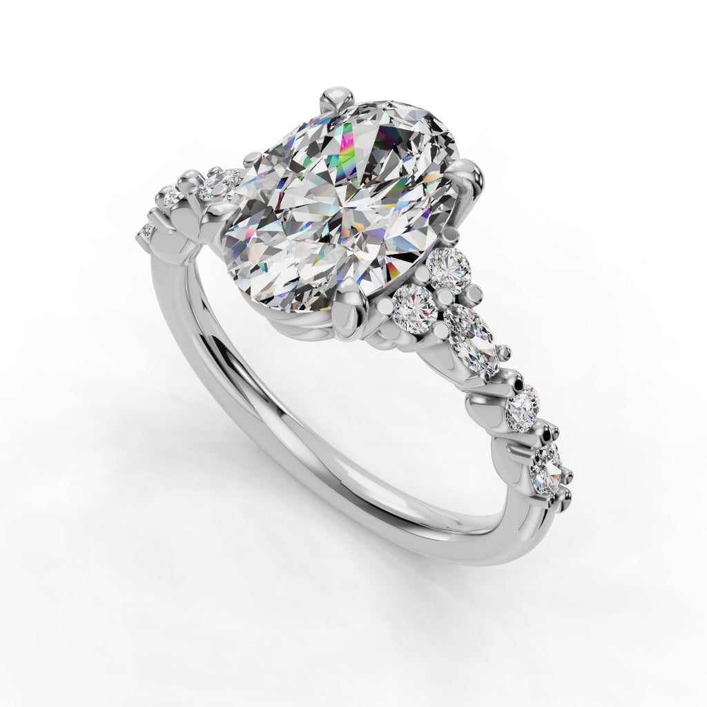 Oval diamond ring with side stones.
