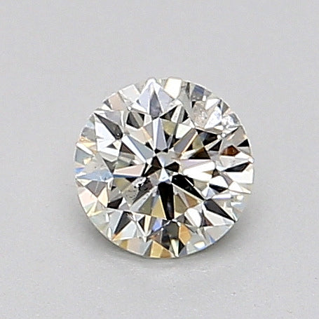 Round diamond, 0.30 carat, K color.