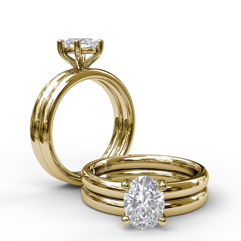 14K yellow gold ring with round diamond.