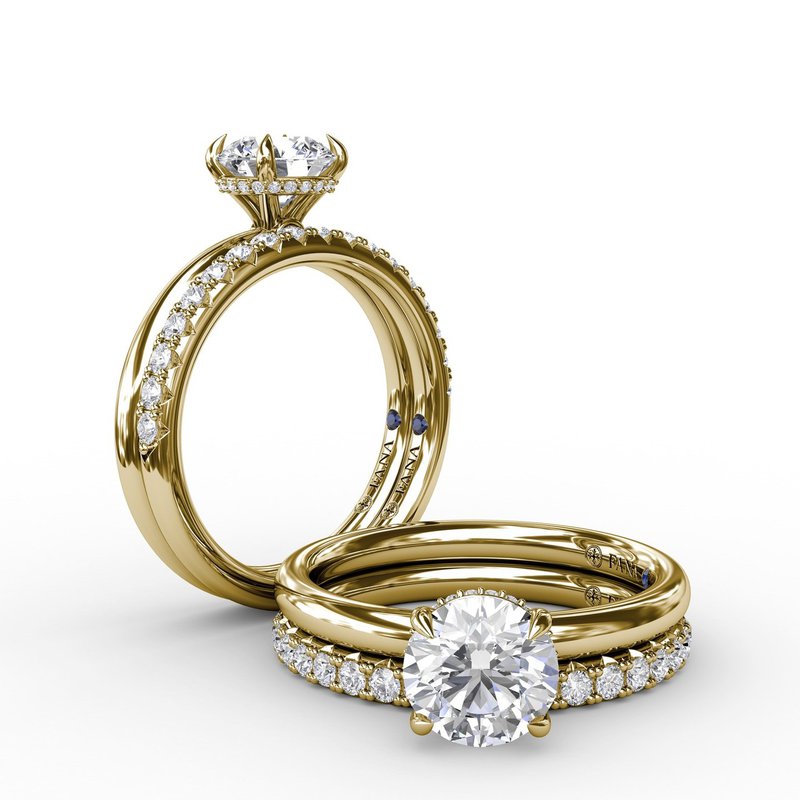 18K yellow gold diamond engagement ring.