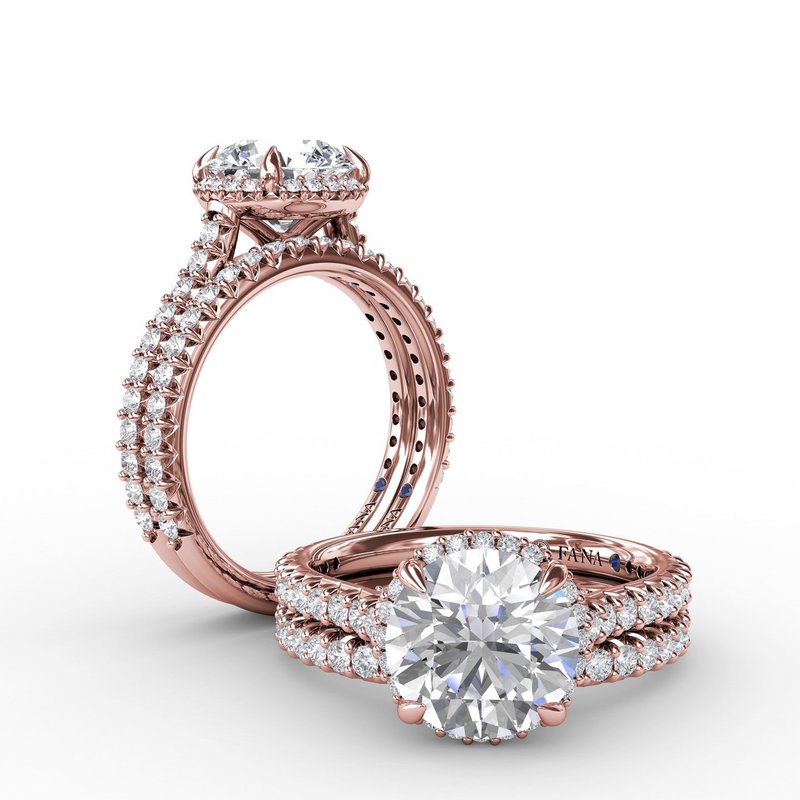 Halo rose gold diamond engagement ring.