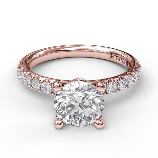 Rose gold diamond engagement ring.