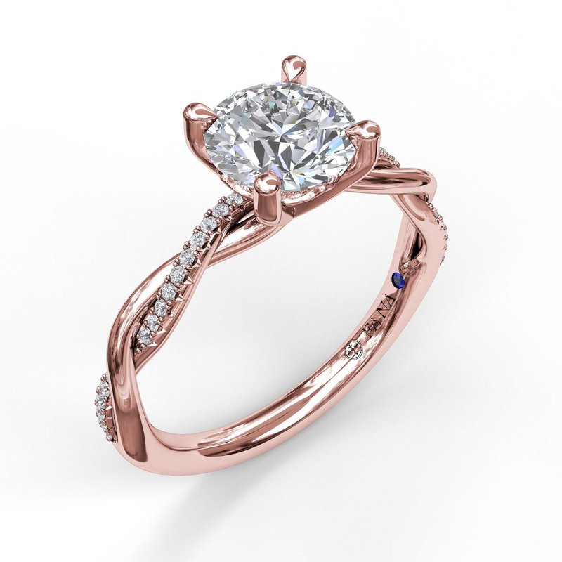 Rose gold ring with round diamond accents.