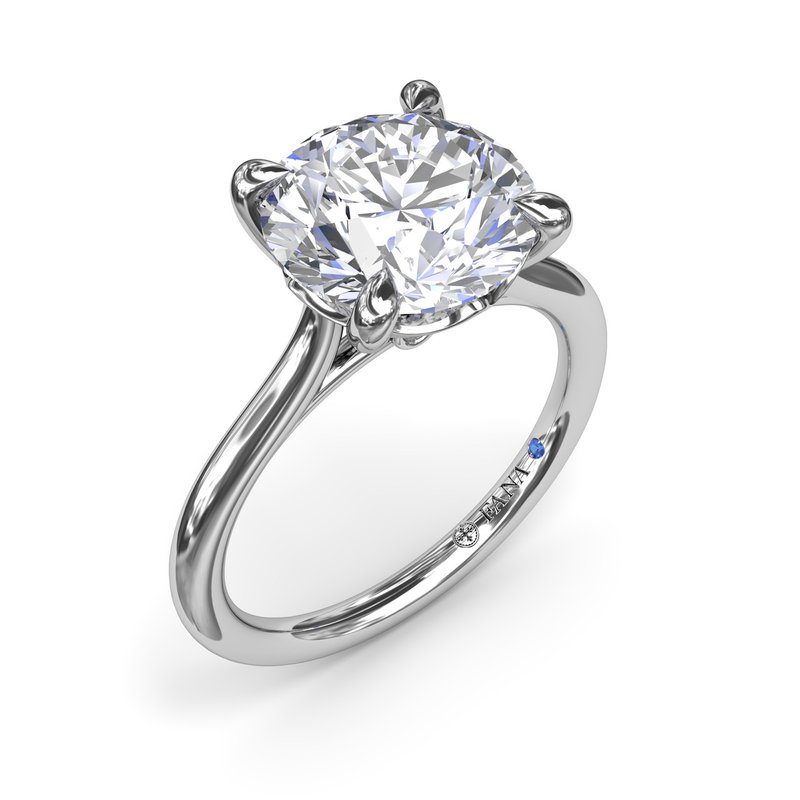 14K white gold solitaire engagement ring.