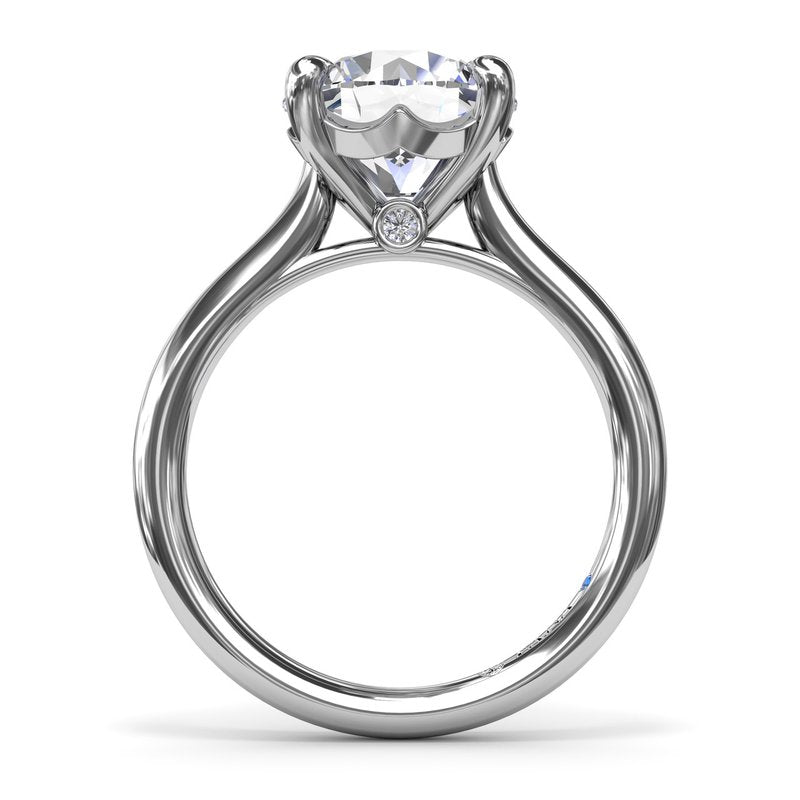 14K white gold solitaire engagement ring.