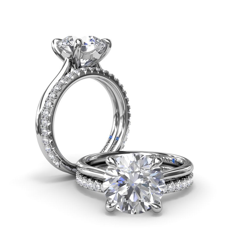 14k white gold ring with round diamonds.
