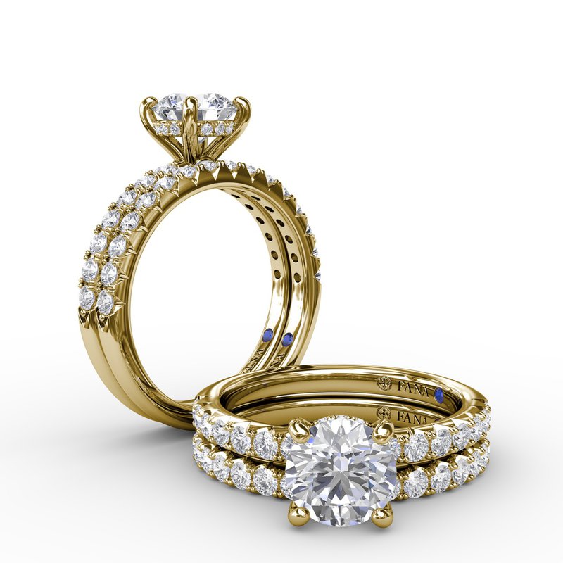 14K yellow gold ring with hidden diamond accents.