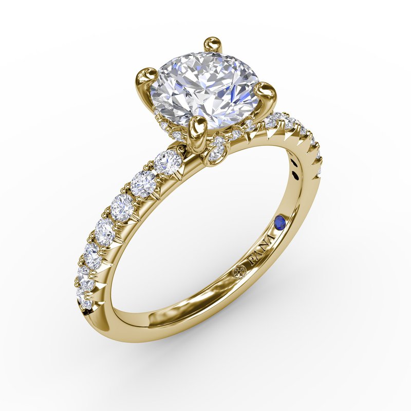 14K yellow gold ring with round diamonds.