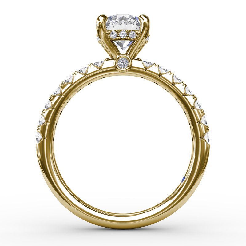 Yellow gold ring with hidden diamond accents.