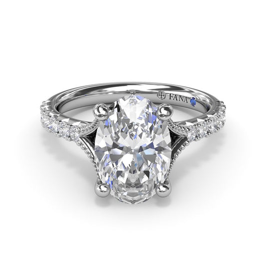 White gold diamond engagement ring with side stones.