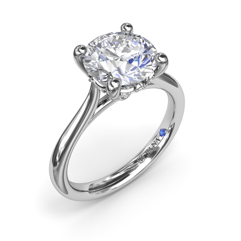 14K white gold solitaire engagement ring.