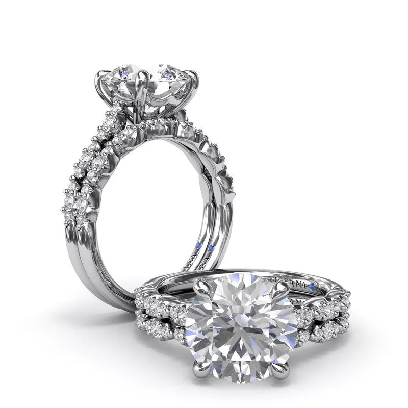14K white gold band with round diamonds.