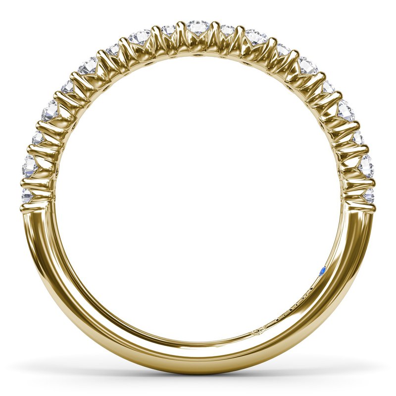 Yellow gold band with various shaped diamonds.