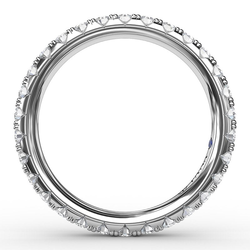 14K white gold band with round diamonds.