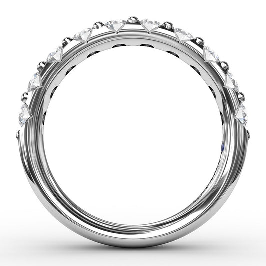 14K white gold band with round diamonds.