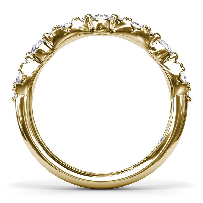 Yellow gold band with various diamonds.