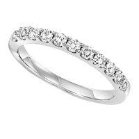 White gold diamond band with sparkling facets.