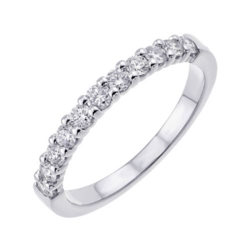 White gold diamond band with multiple facets.