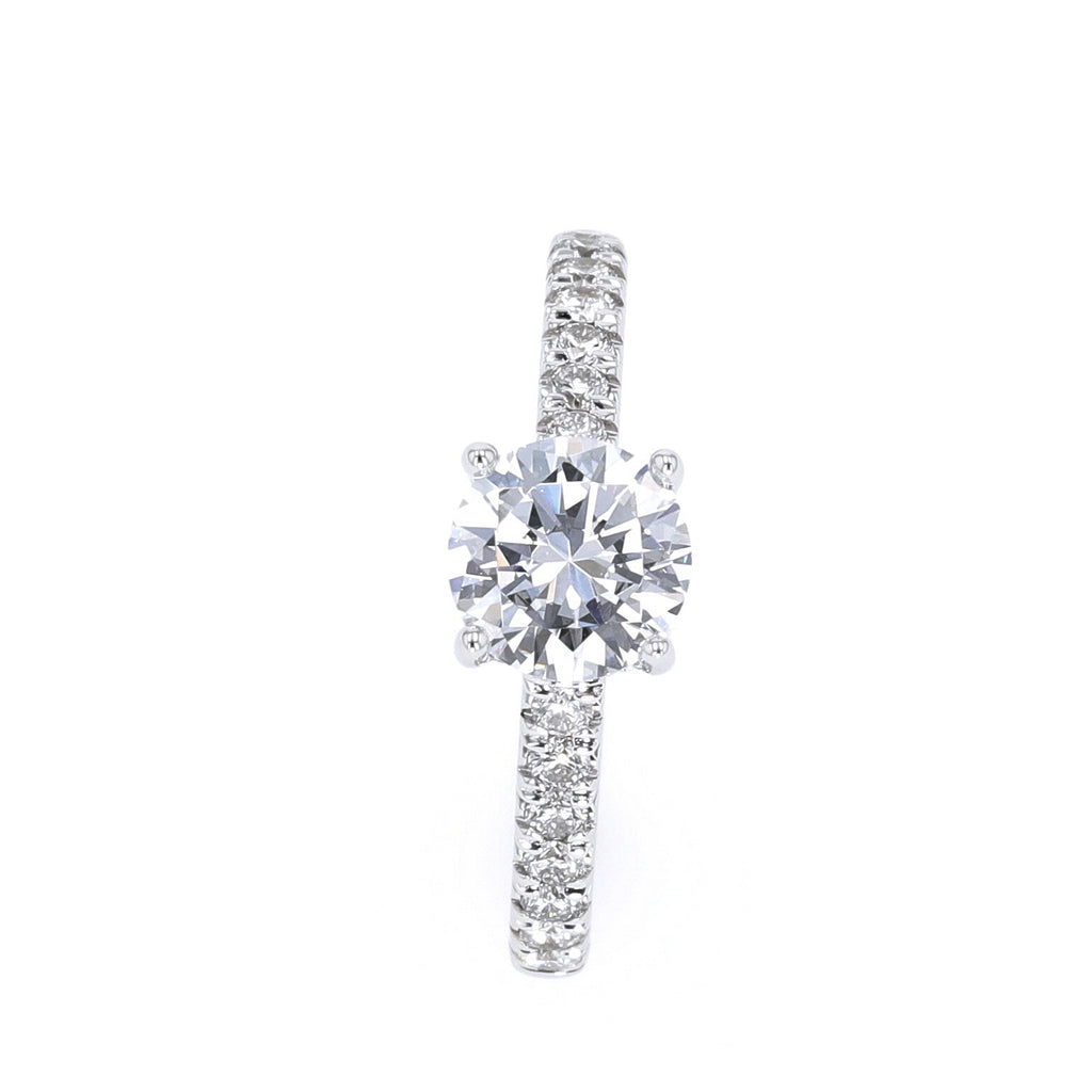 Round diamond engagement ring, white gold band.