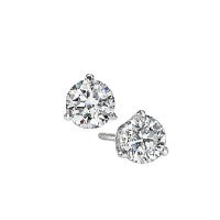 Round diamond stud earrings, white gold setting.