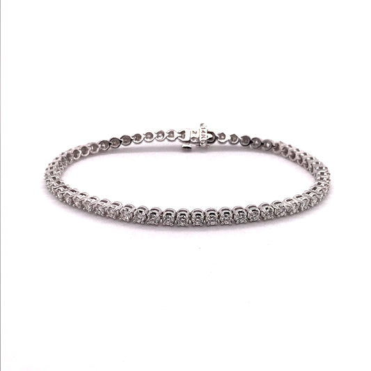 White gold diamond tennis bracelet, round stones.