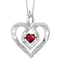 Sterling silver heart pendant with ruby centerpiece.