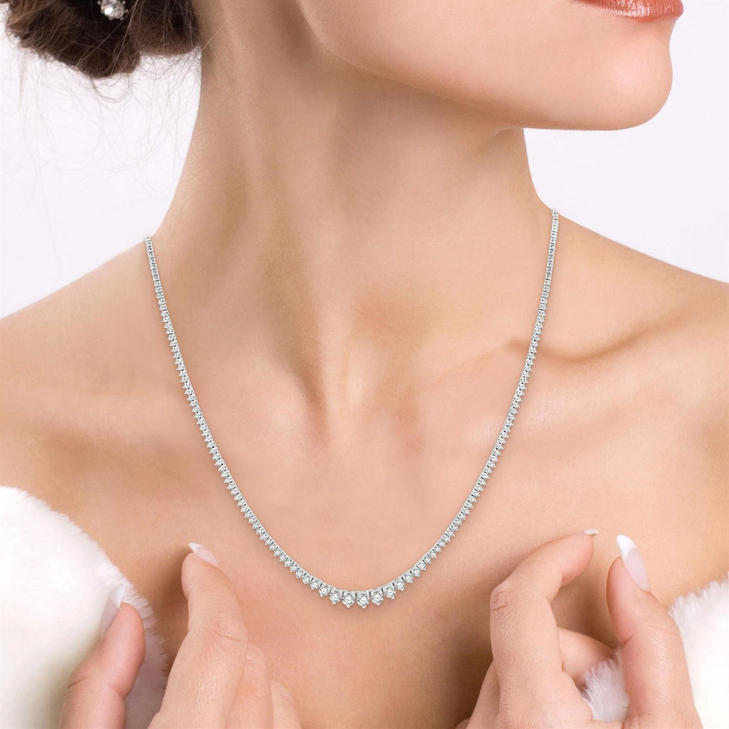 Graduated Diamond Tennis Necklace in 14k White Gold. Available in 5 ctw to 15 ctw.
