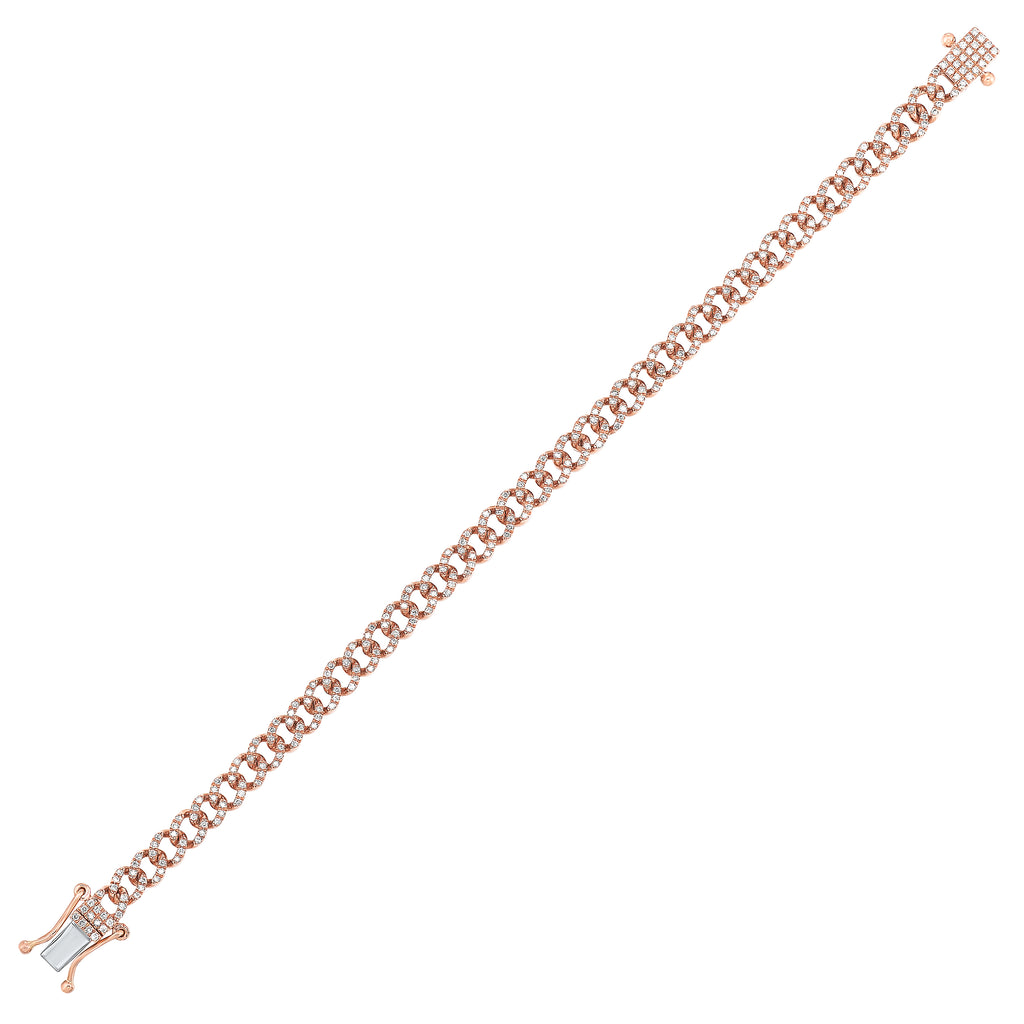 Pave diamond Cuban link bracelet in gold.