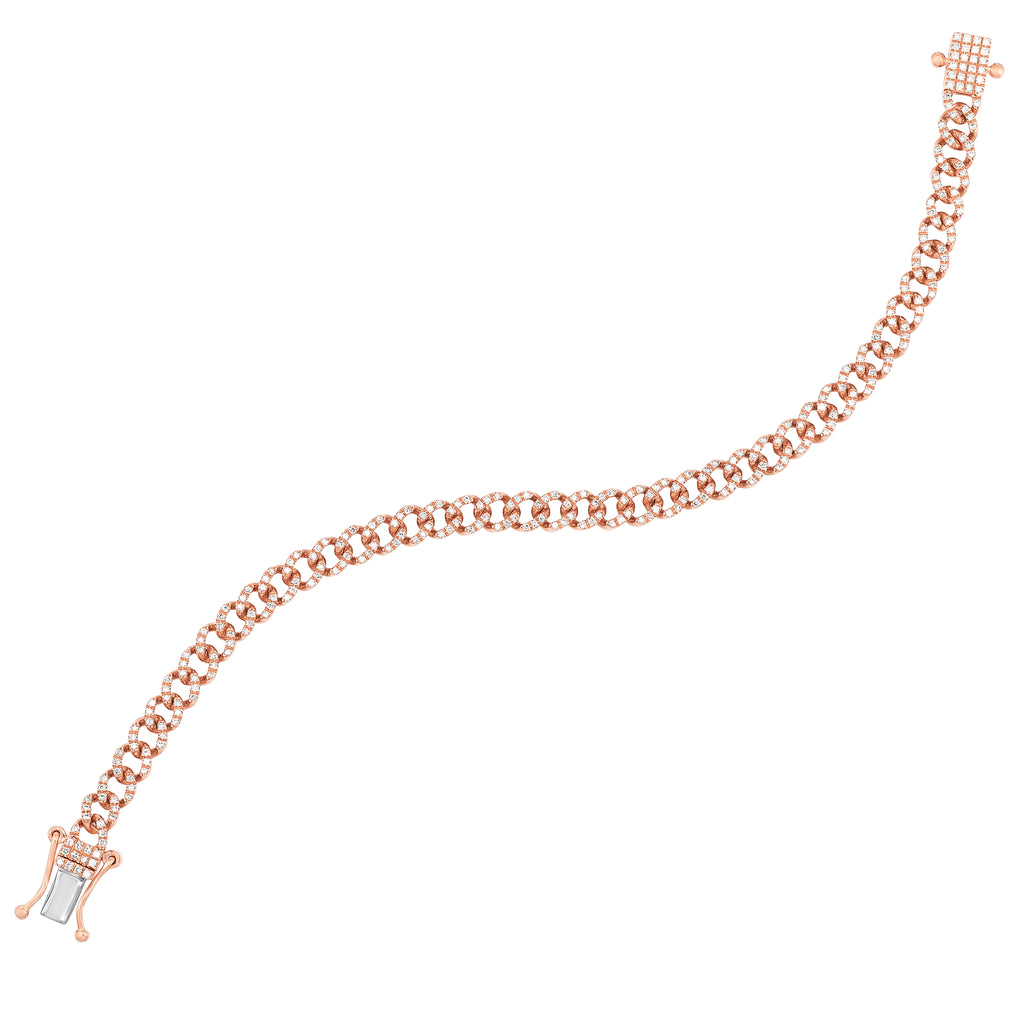 Pave diamond Cuban link bracelet in gold.