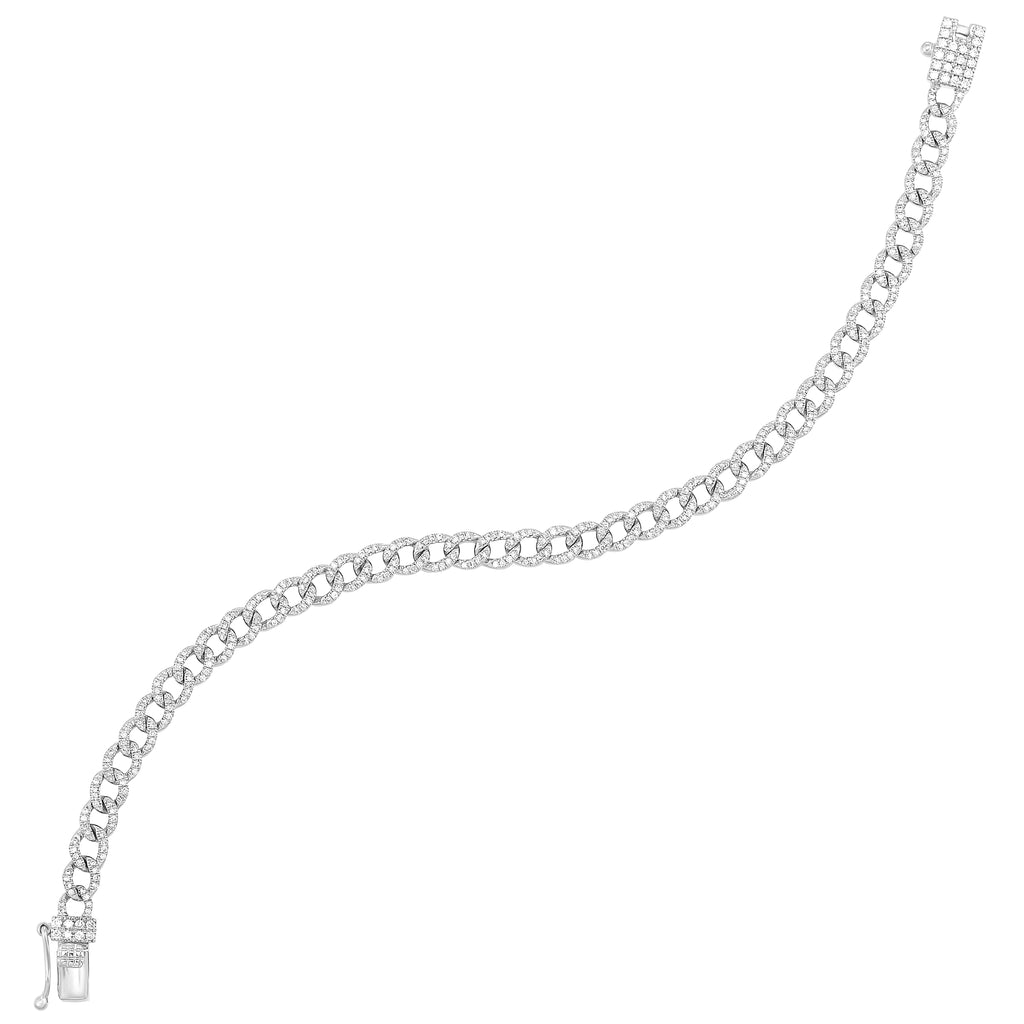 Pave diamond Cuban link bracelet in gold.