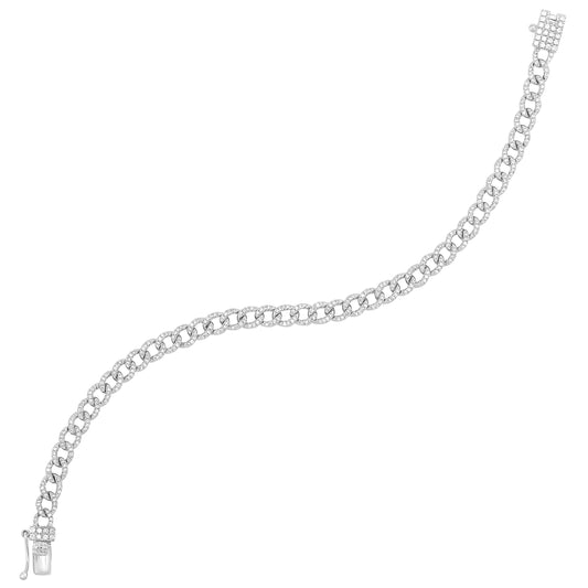 Pave diamond Cuban link bracelet in gold.