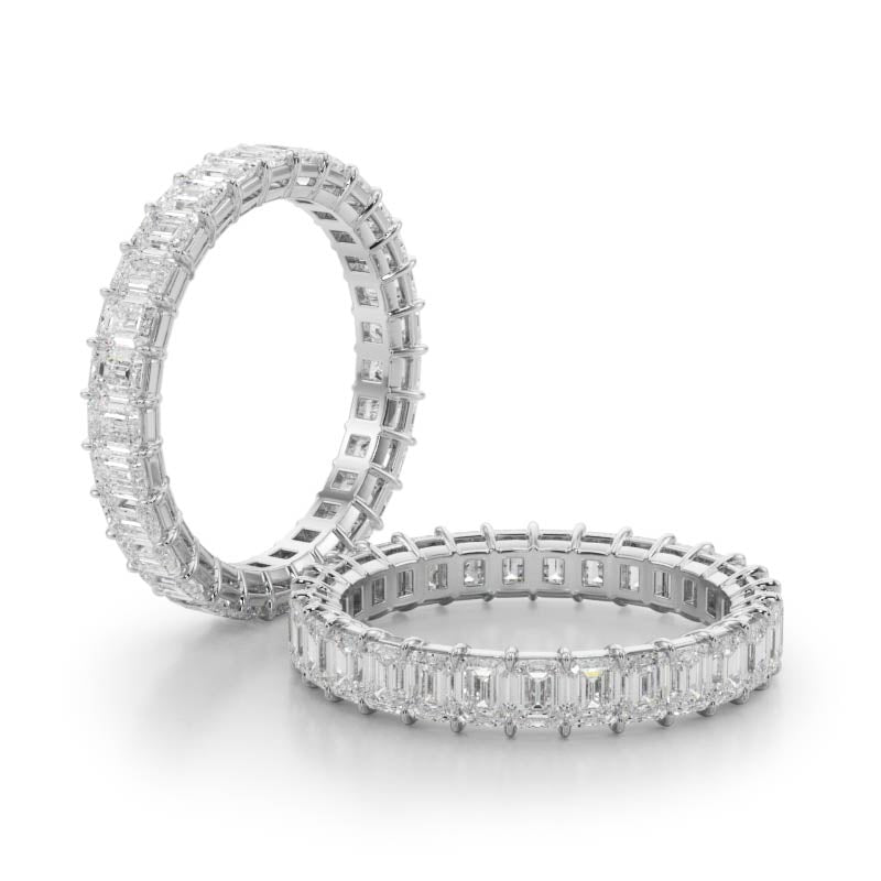 Emerald cut diamond eternity band, white gold.