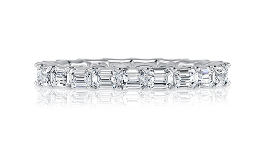 East-West Emerald Cut Diamond Eternity Band in White Gold. Available in 3.50 ctw and 4.50 ctw.