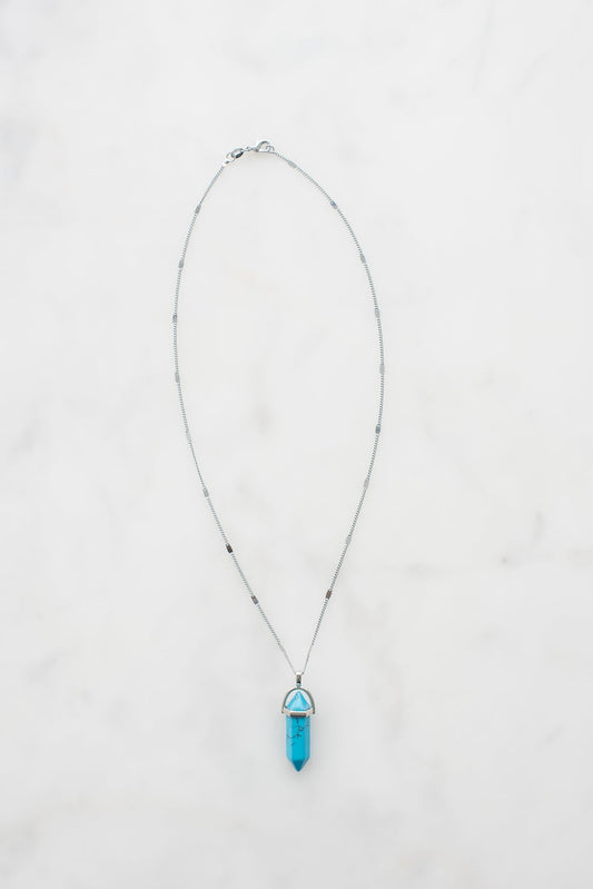 Turquoise gemstone on sterling silver chain.