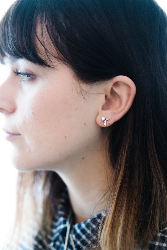 Sterling silver earrings with diamond accents.