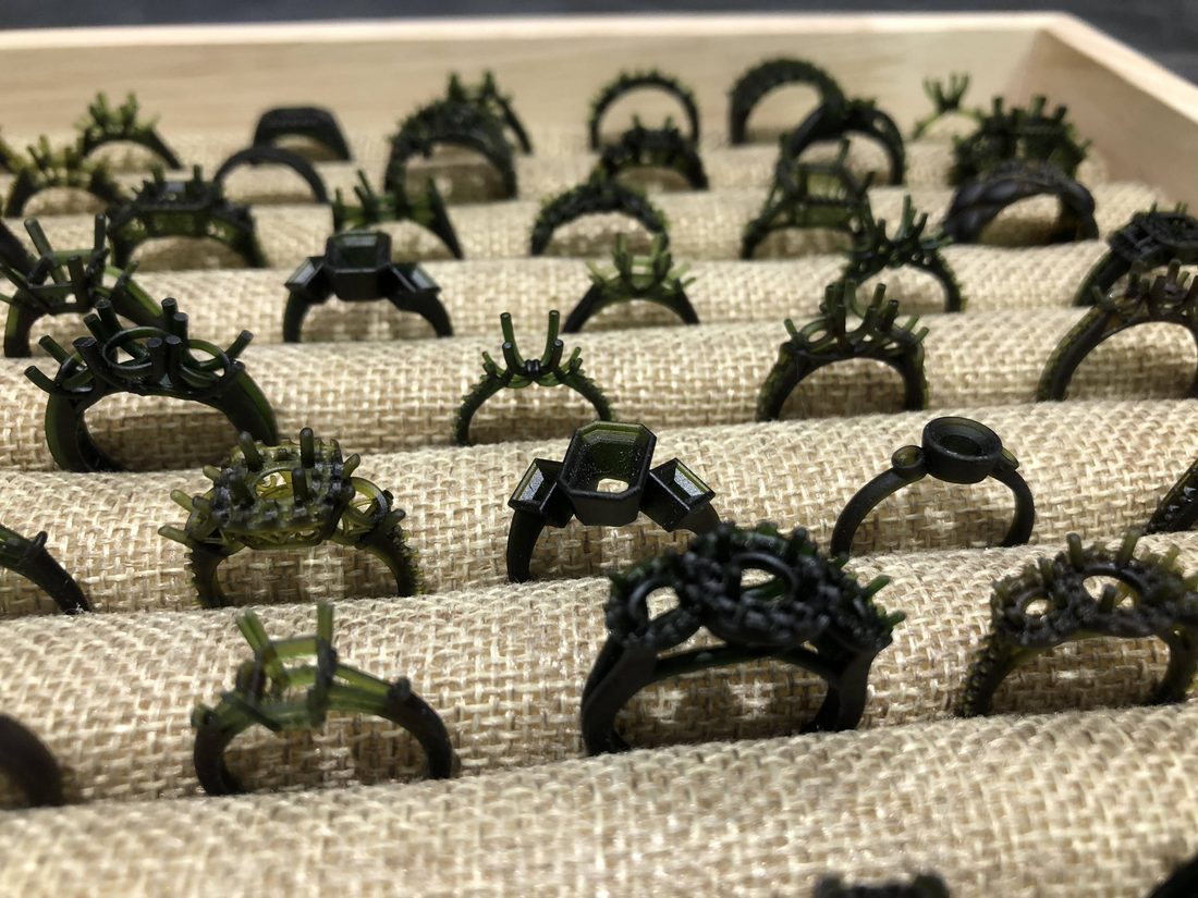 Green castable wax models of custom JEWLVISION engagement ring designs before casting at Marks Jewelers